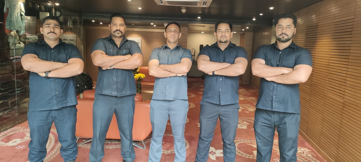 Technician maintaining server racks